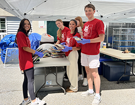  students sort books at Community Center of Northern Westchester